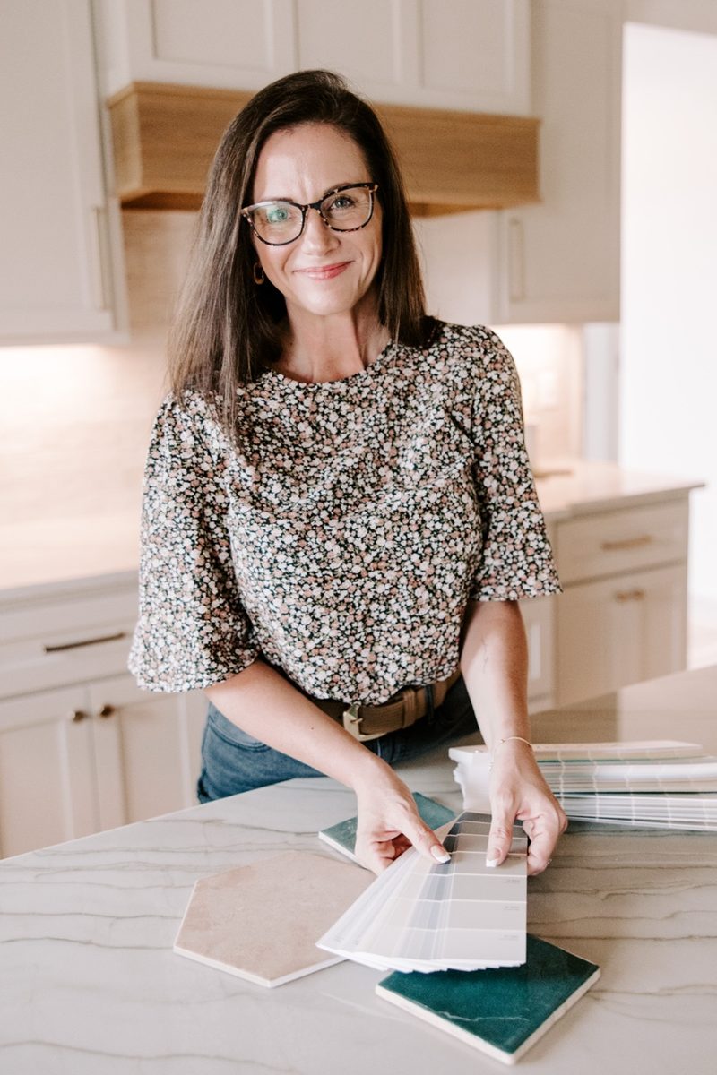 Laura reviewing design and material samples